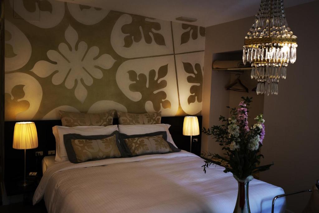 Postel nebo postele na pokoji v ubytování Avogaria 5 Rooms