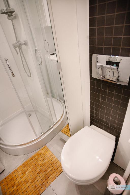 Kúpeľňa v ubytovaní Warsaw Concierge Polin Apartment