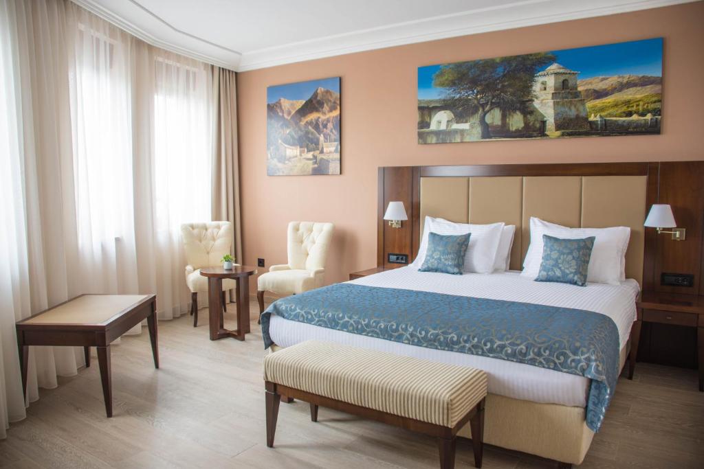 Postel nebo postele na pokoji v ubytování Xenon Hotel & SPA