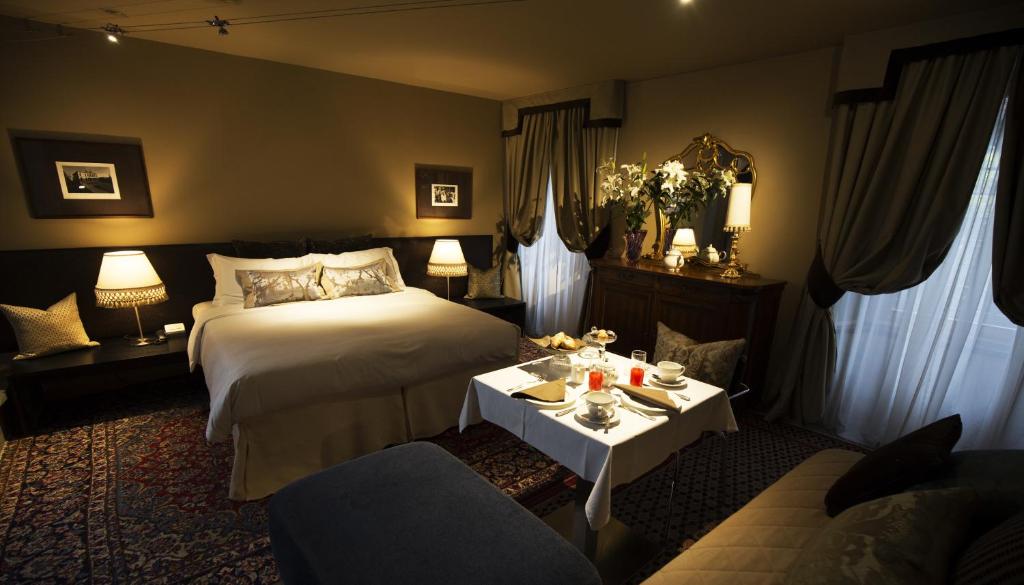 Postel nebo postele na pokoji v ubytování Avogaria 5 Rooms