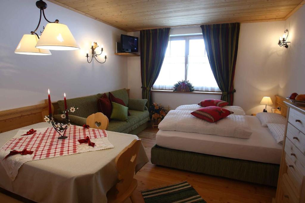 Postel nebo postele na pokoji v ubytování Apartments Sol E Nef
