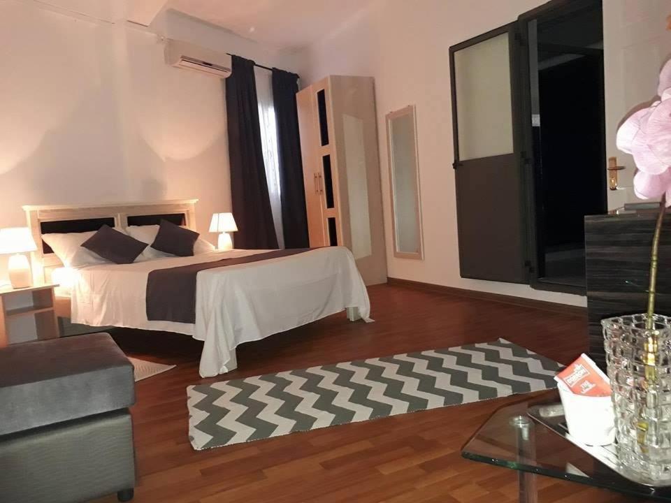 Postel nebo postele na pokoji v ubytování Hello Guest House