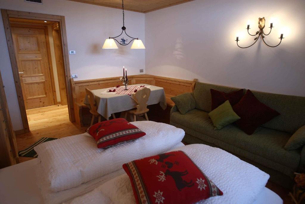 Postel nebo postele na pokoji v ubytování Apartments Sol E Nef