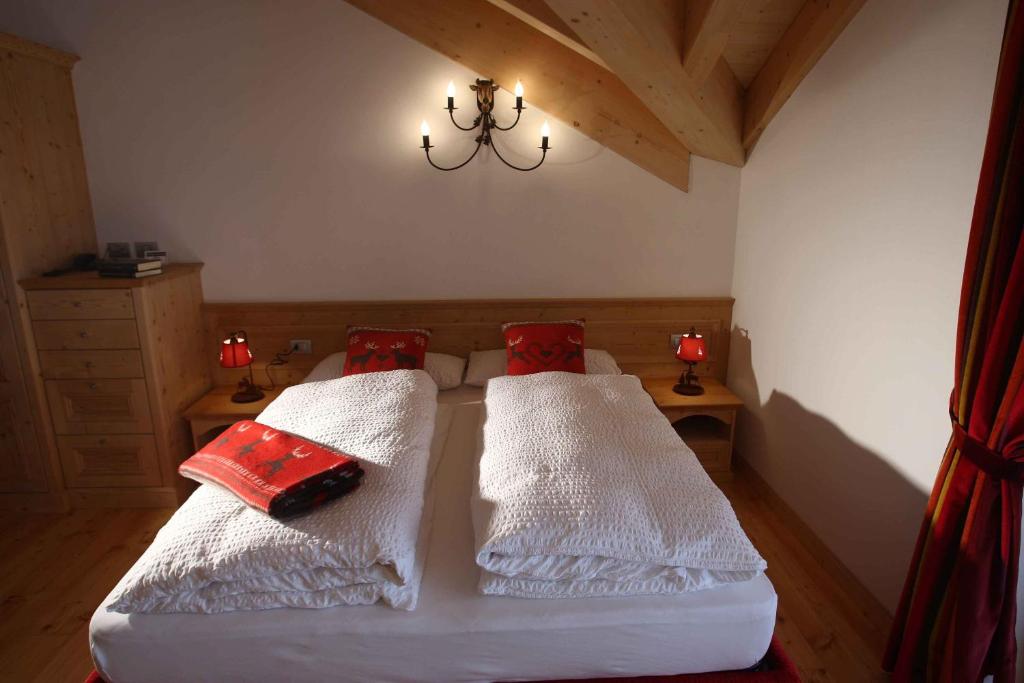 Postel nebo postele na pokoji v ubytování Apartments Sol E Nef