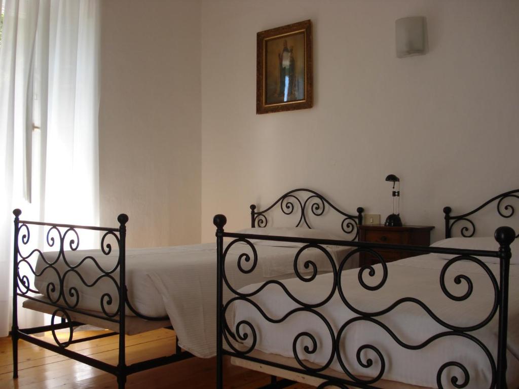 Postel nebo postele na pokoji v ubytování Santuario di Oropa