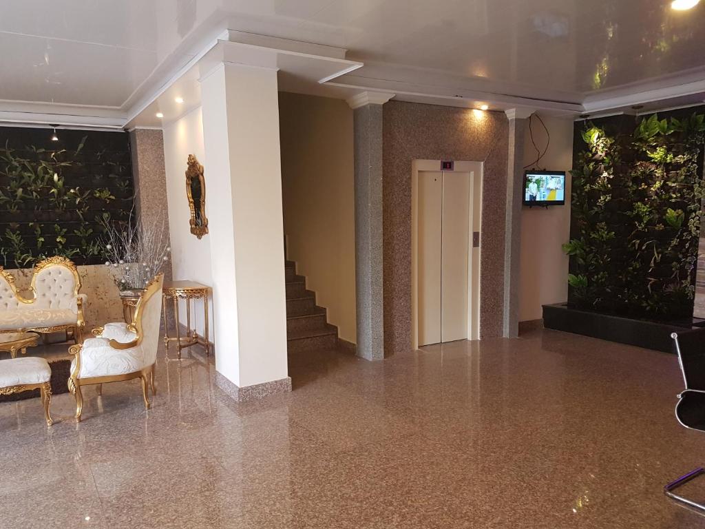 TV a/nebo společenská místnost v ubytování Hotel Castellana Group