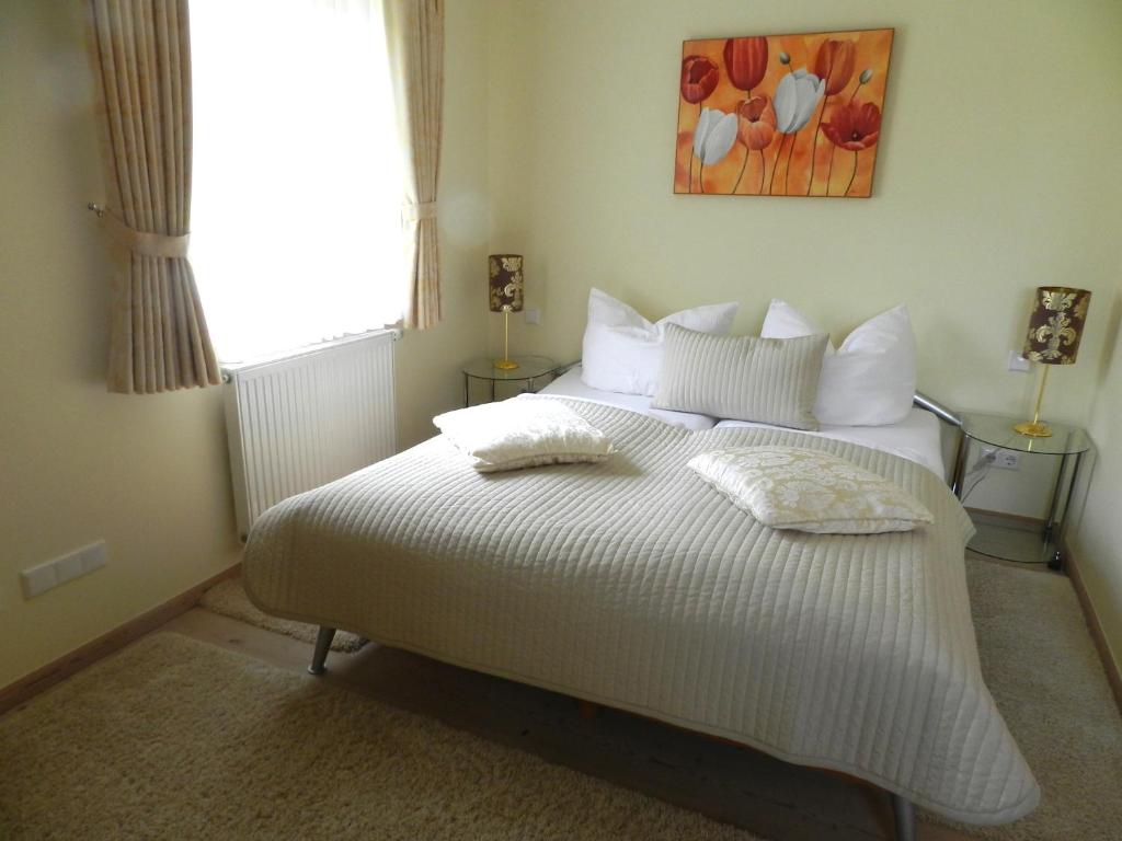 Postel nebo postele na pokoji v ubytování Landhaus am Bach
