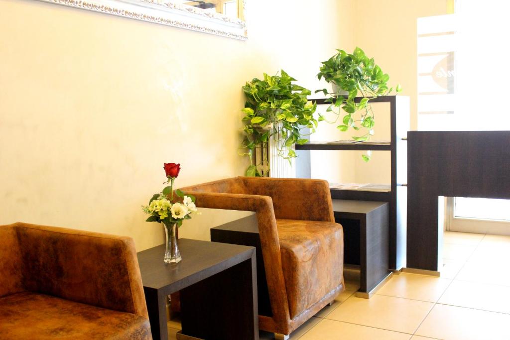 A seating area at Hotel Savoia
