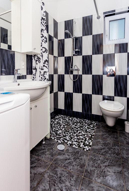 Kúpeľňa v ubytovaní Apartments Blaža