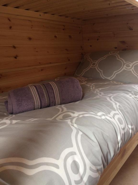 Letto o letti in una camera di Coach Field Camp