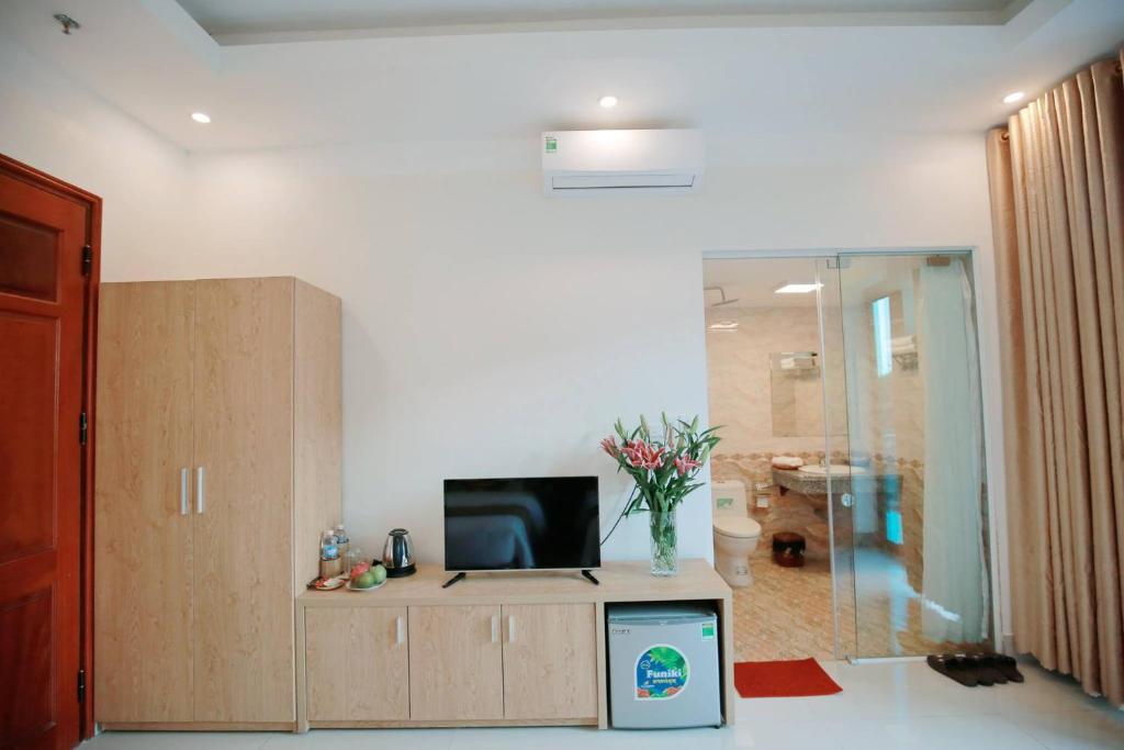 TV a/nebo společenská místnost v ubytování Anova Airport Hotel - Convenient & Friendly