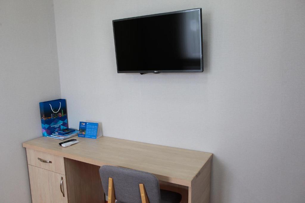 TV a/nebo společenská místnost v ubytování Hotel Botanica