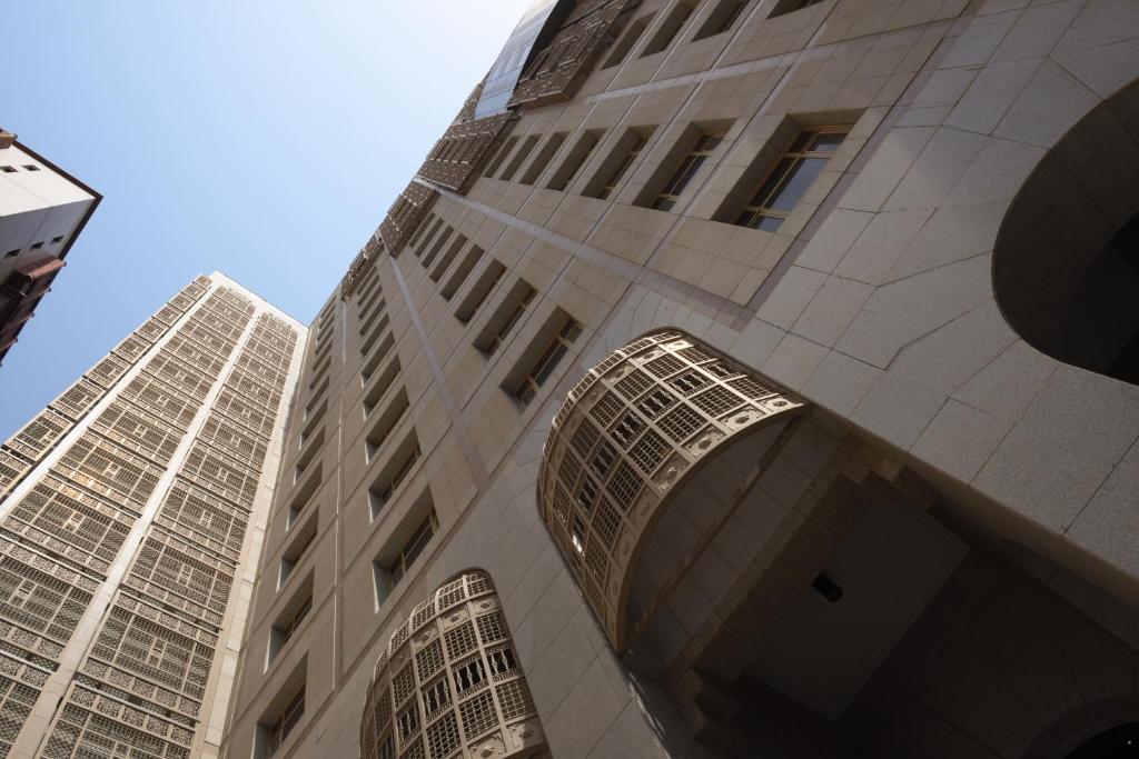 a tall building with three windows on it at Saja Al Madinah in Al Madinah
