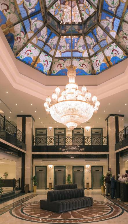 a large chandelier in the lobby of a hotel at Saja Al Madinah in Al Madinah