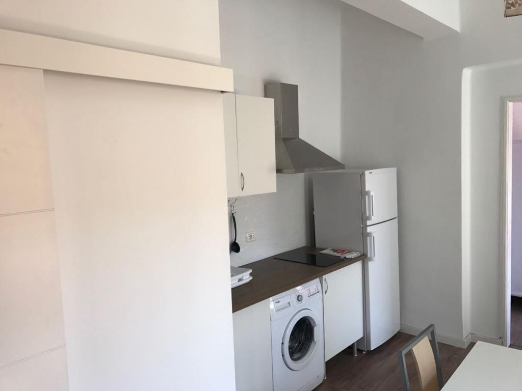 A kitchen or kitchenette at Apartamentos La Concepción