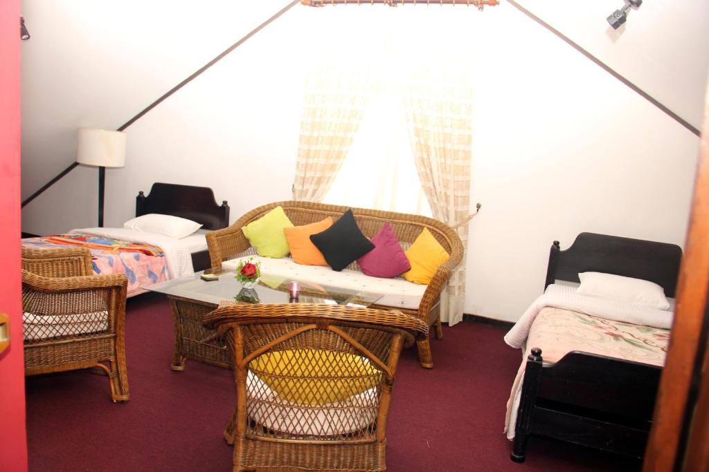 Postel nebo postele na pokoji v ubytování Perera Homestay