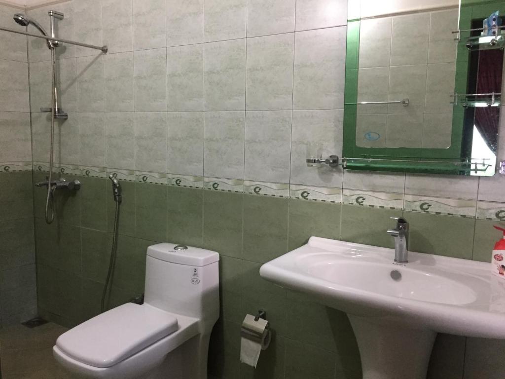 Koupelna v ubytování Perera Homestay