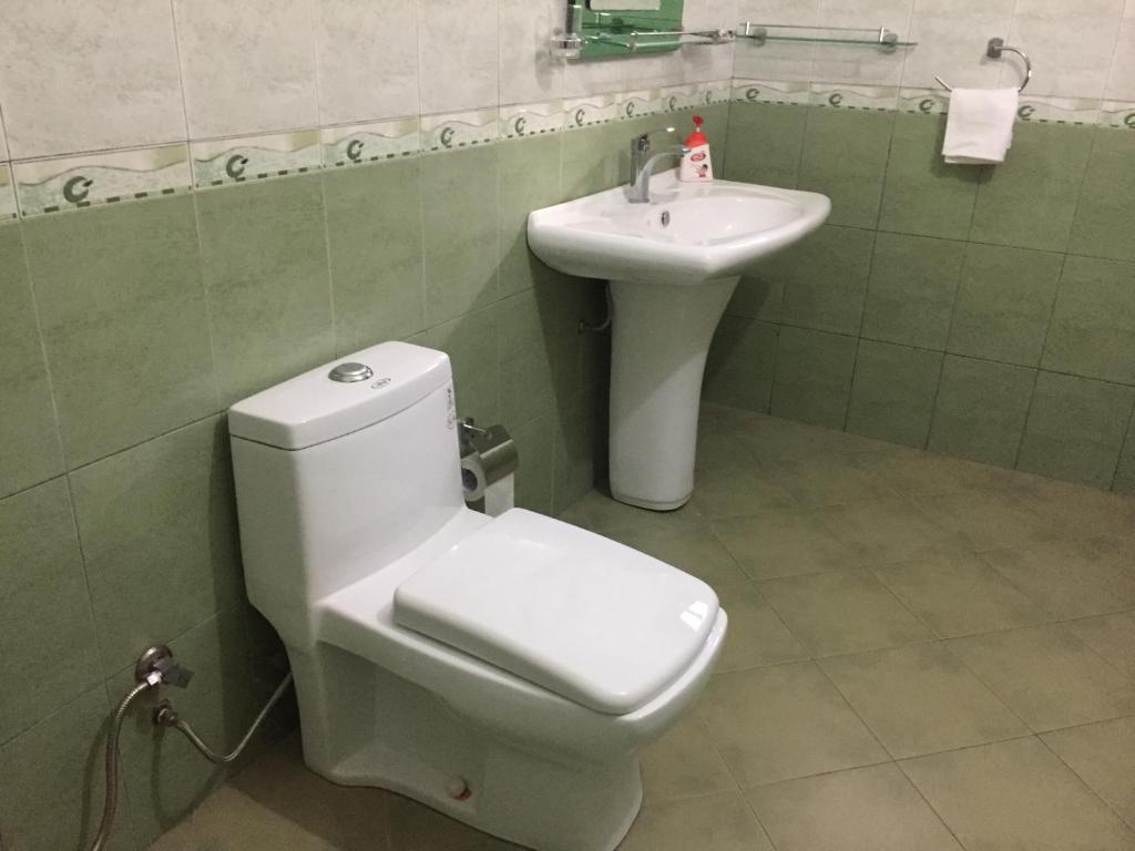 Koupelna v ubytování Perera Homestay