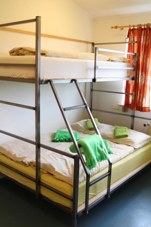 Voodi või voodid majutusasutuse Helgafell Hostel toas