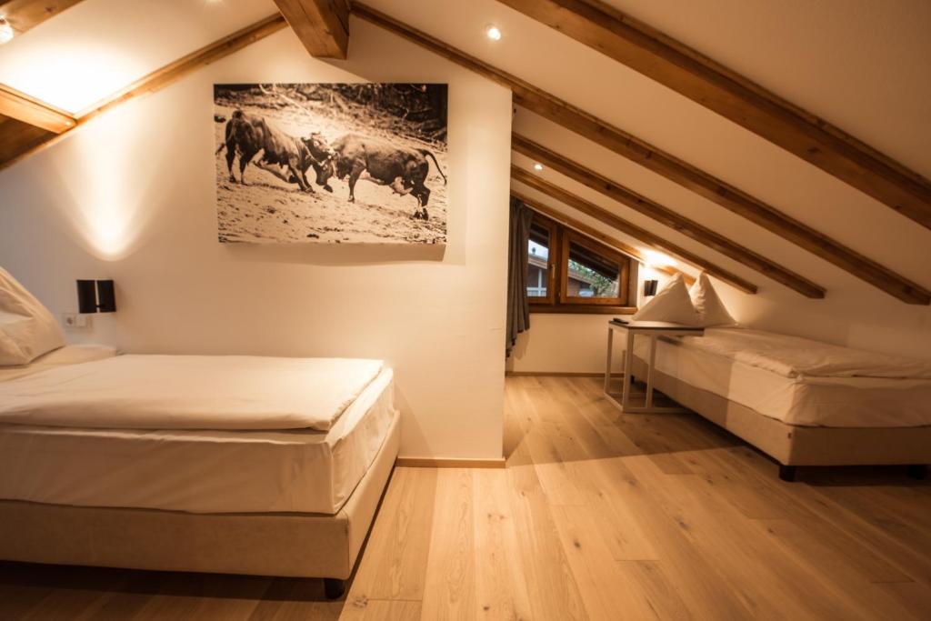 Postel nebo postele na pokoji v ubytování Hotel Daniela