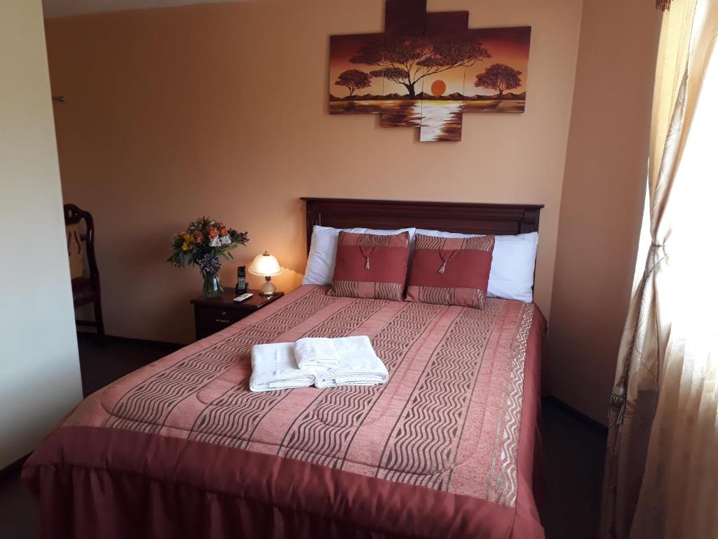 Postel nebo postele na pokoji v ubytování Hotel Residencial El Viajero