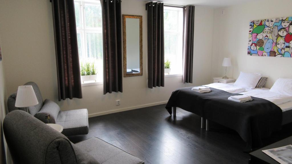 Postel nebo postele na pokoji v ubytování Hedenstugan B&B Hotel