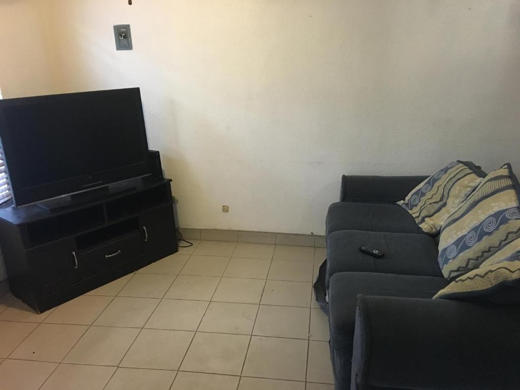 TV a/nebo společenská místnost v ubytování Apartment Blanquita Consulado Cedros