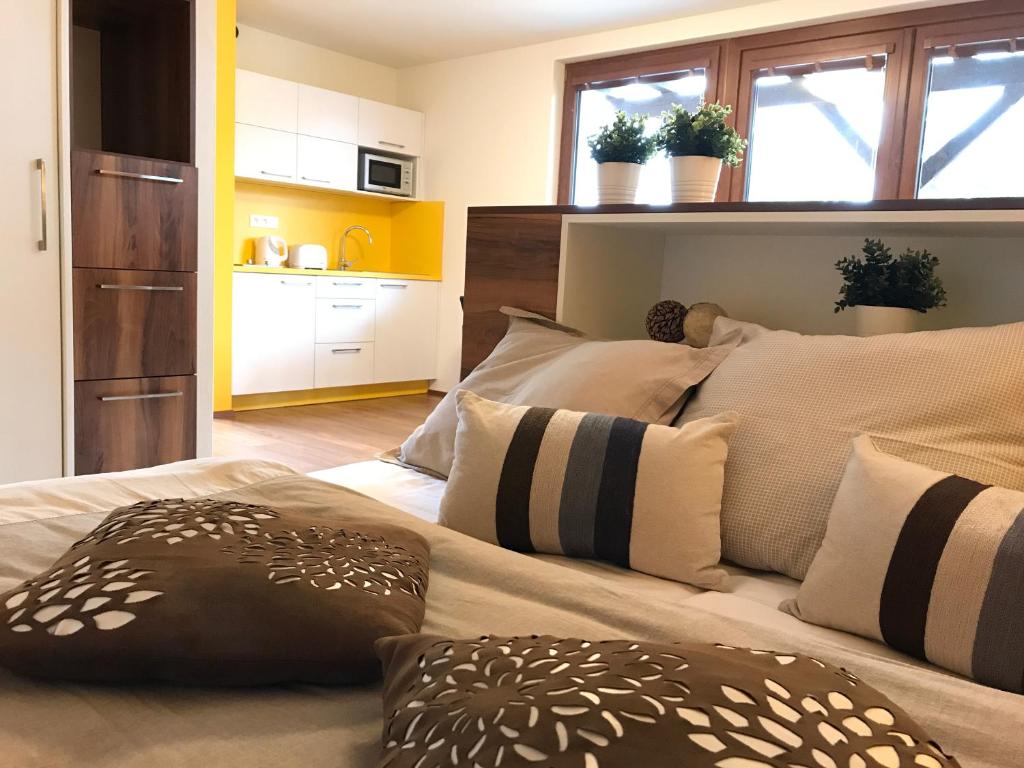 Postel nebo postele na pokoji v ubytování Apartmány Pinie Lipno
