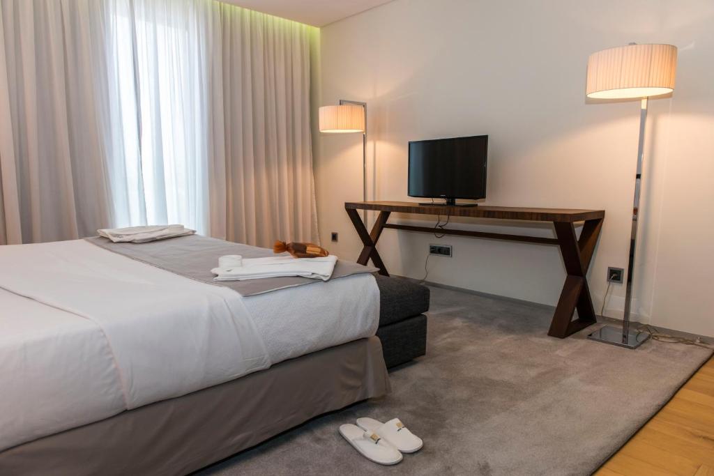 Postel nebo postele na pokoji v ubytování Hotel Pérola