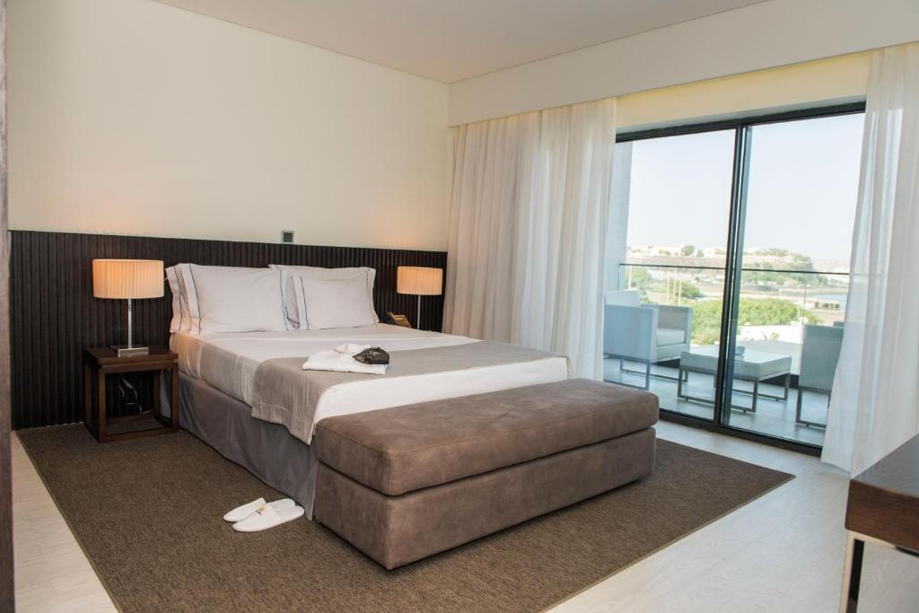 Postel nebo postele na pokoji v ubytování Hotel Pérola