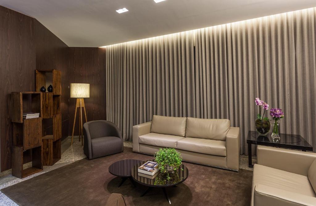 Posezení v ubytování Leopoldo Hotel