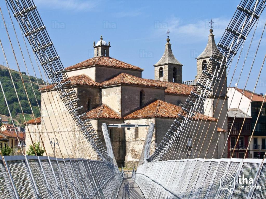 a view of the church from the suspension bridge at Hostal los nogales in Cangas del Narcea