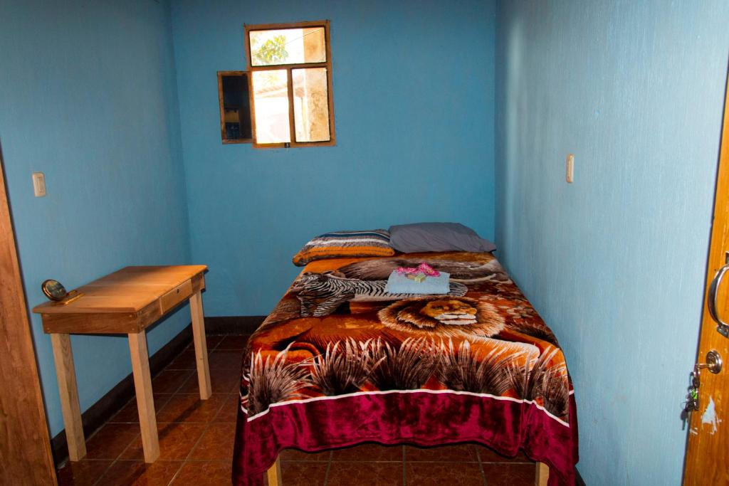 Cama o camas de una habitación en Posada Maná