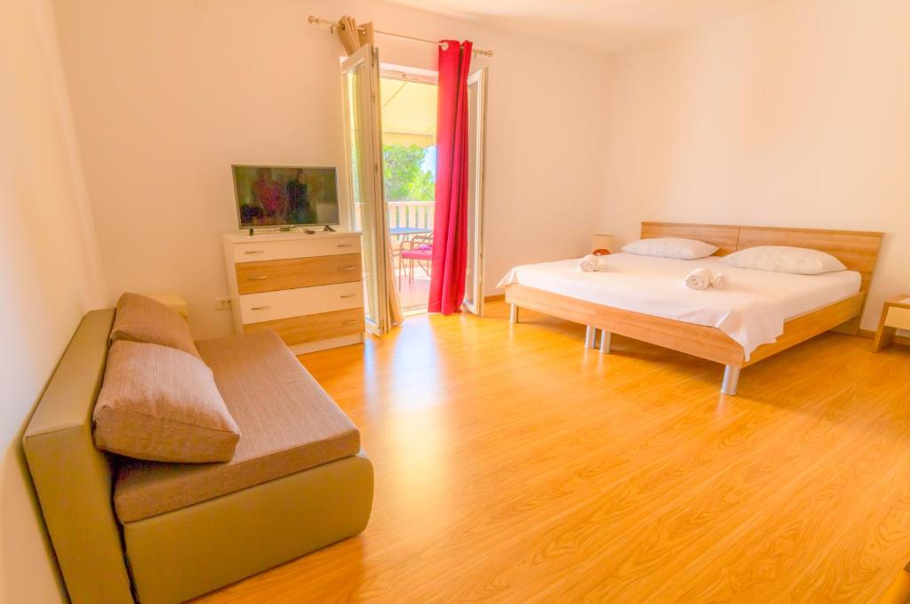 Postel nebo postele na pokoji v ubytování Rooms Karla