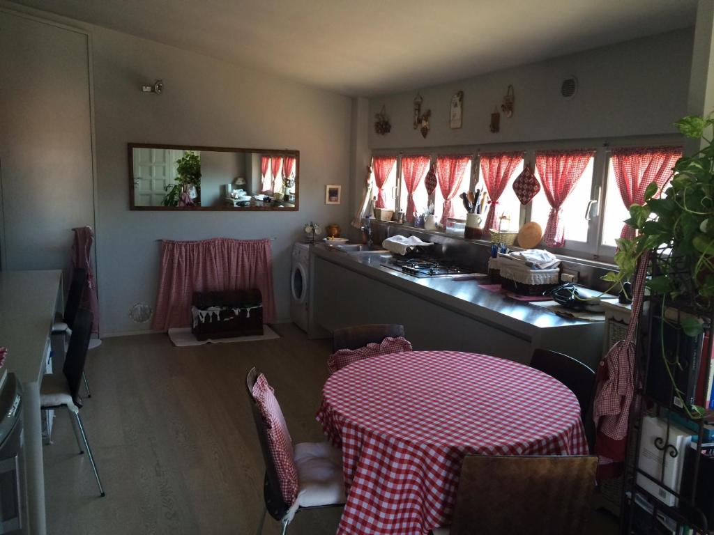 A restaurant or other place to eat at Rinidia - Siena Celso Cittadini