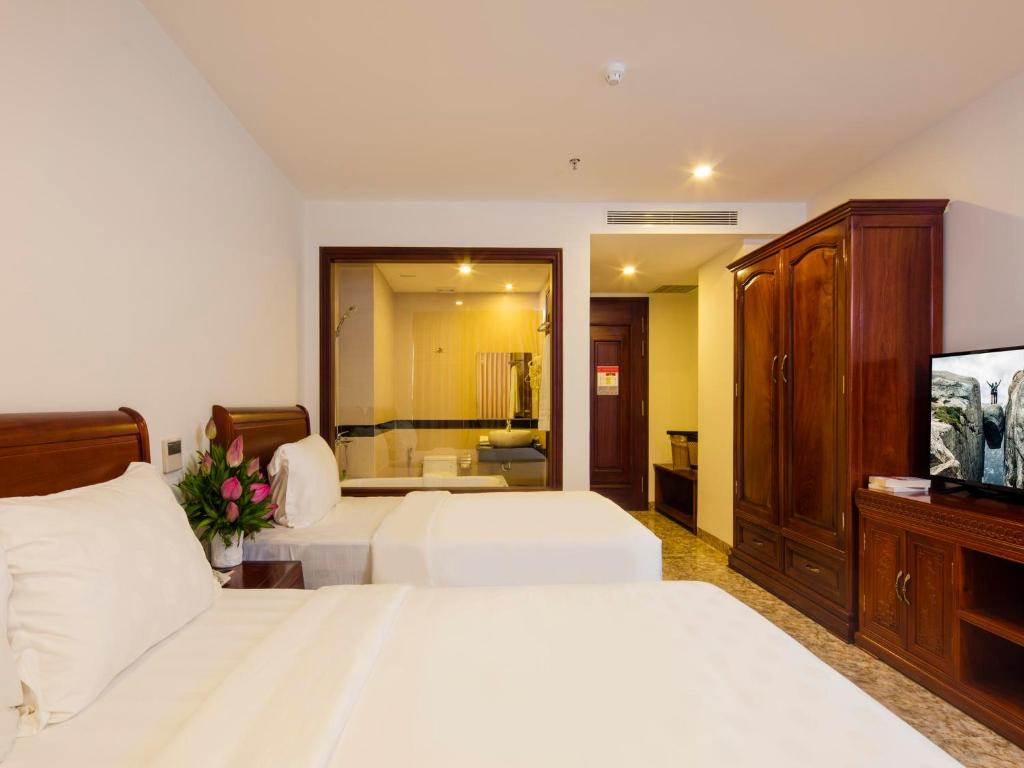 Phòng Deluxe 3 Người với Ban công và Tầm nhìn ra Biển
