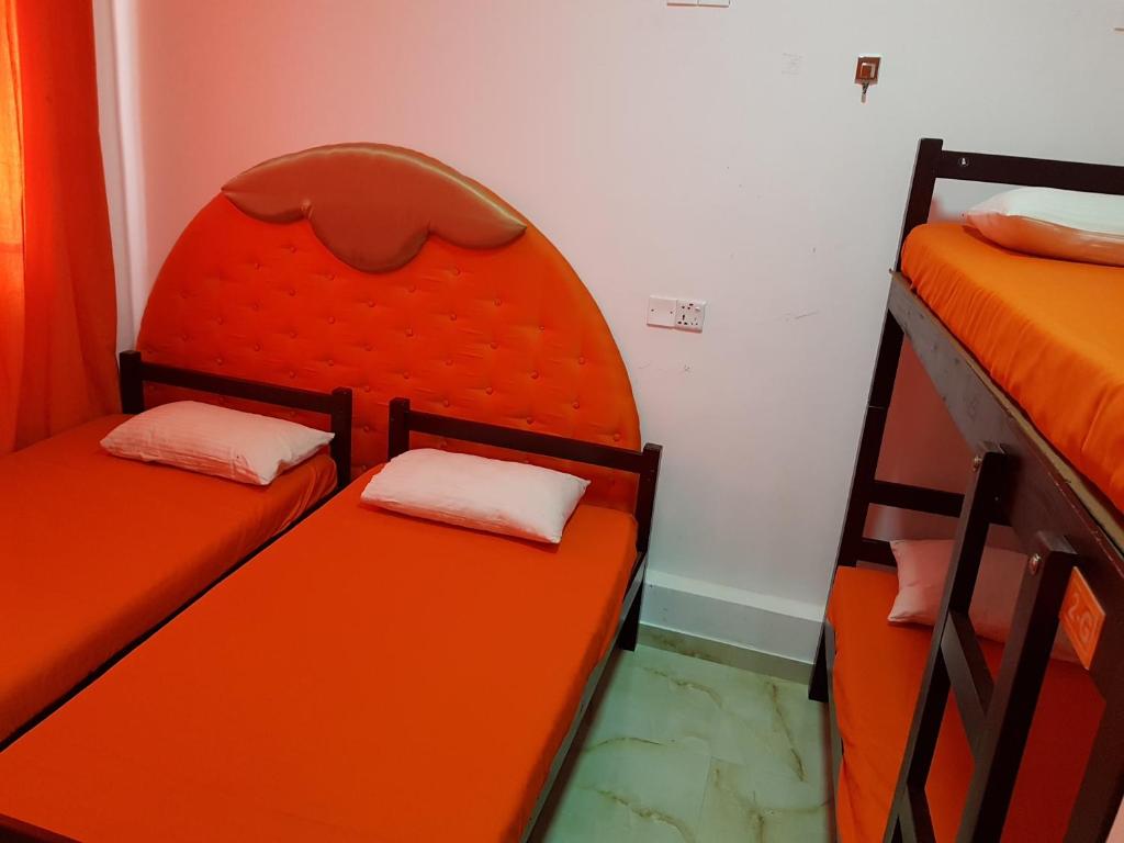 Postel nebo postele na pokoji v ubytování Thambili Island @ Stubbs