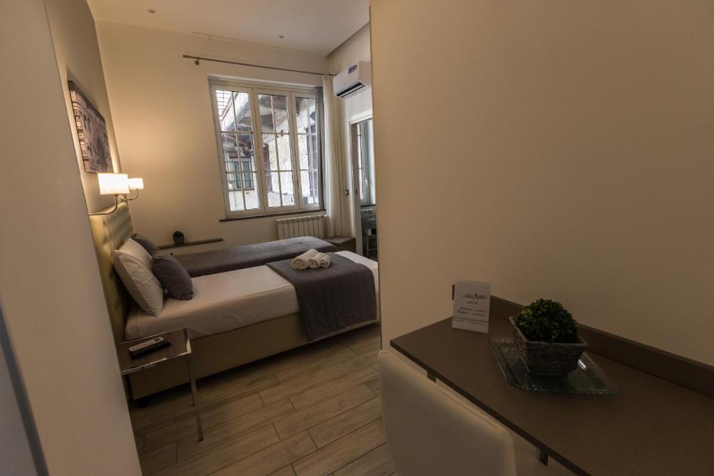 Posteľ alebo postele v izbe v ubytovaní Casantò guest home