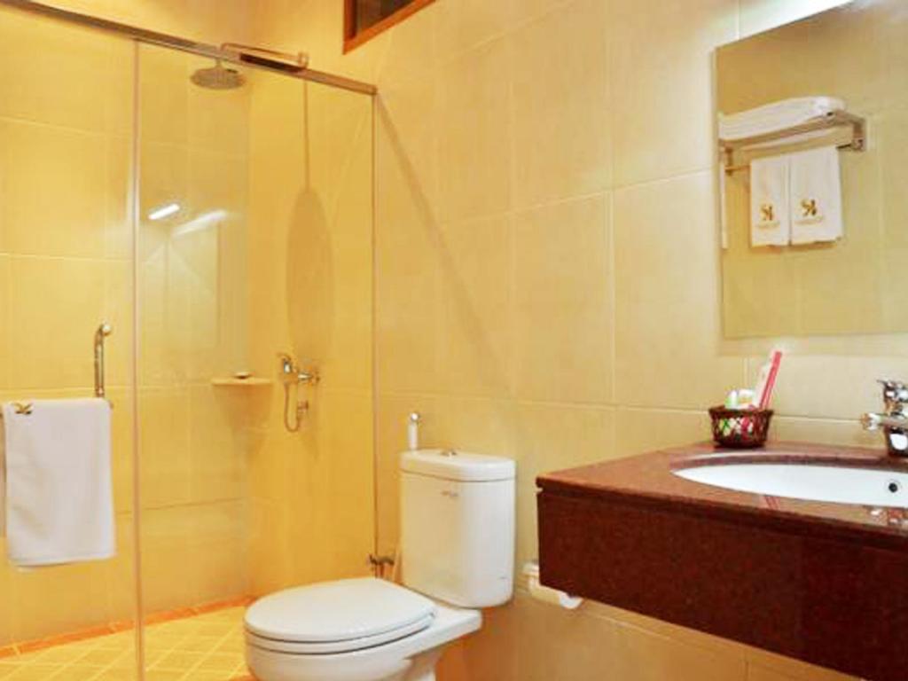 Koupelna v ubytování Kertanegara Premium Guest House