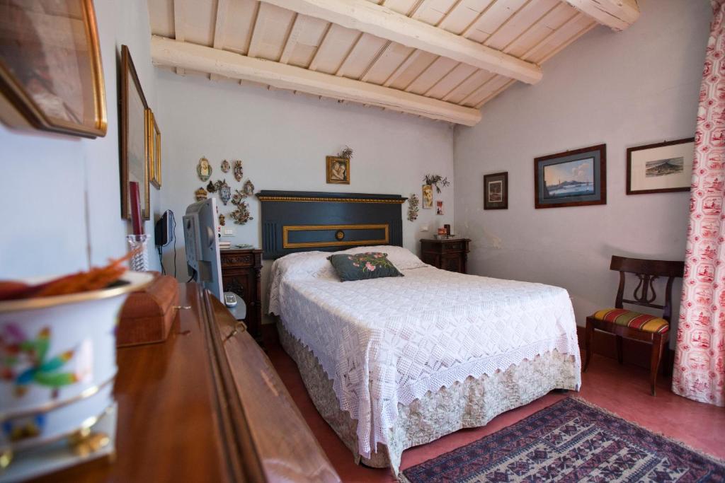 En eller flere senge i et værelse på Baglio Sant'Andrea