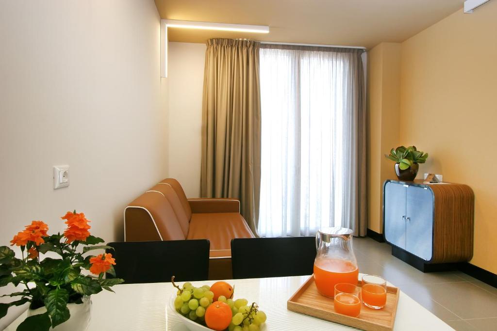 a hospital room with a table with fruit on it at Residence Terminus in Rimini