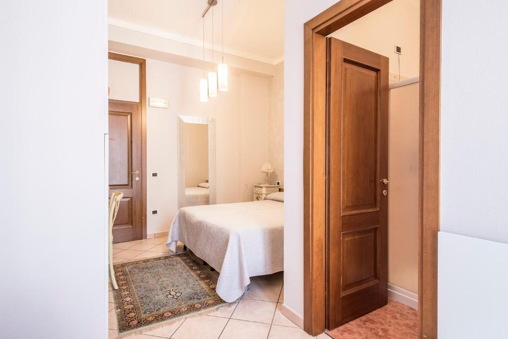 Postel nebo postele na pokoji v ubytování Trattoria Milani