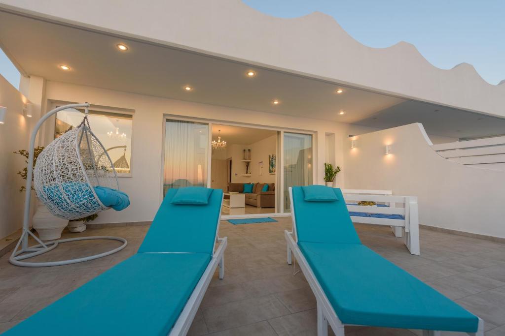 Posezení v ubytování Aristodimos Luxury Apartments