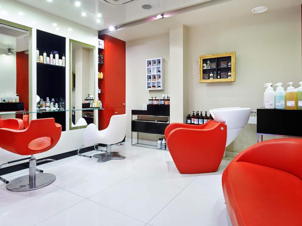 Televízia a/alebo spoločenská miestnosť v ubytovaní VacationClub - Olympic Park Apartment 404