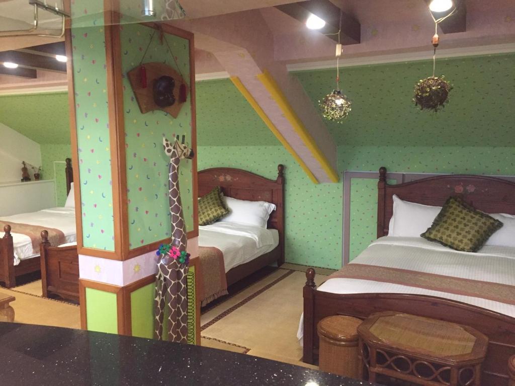 Postel nebo postele na pokoji v ubytování Ocean Deep Hostel