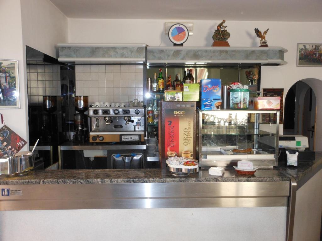 Kuchyň nebo kuchyňský kout v ubytování Hotel Fiammetta