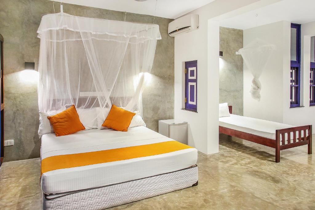 Postel nebo postele na pokoji v ubytování Culture Resort
