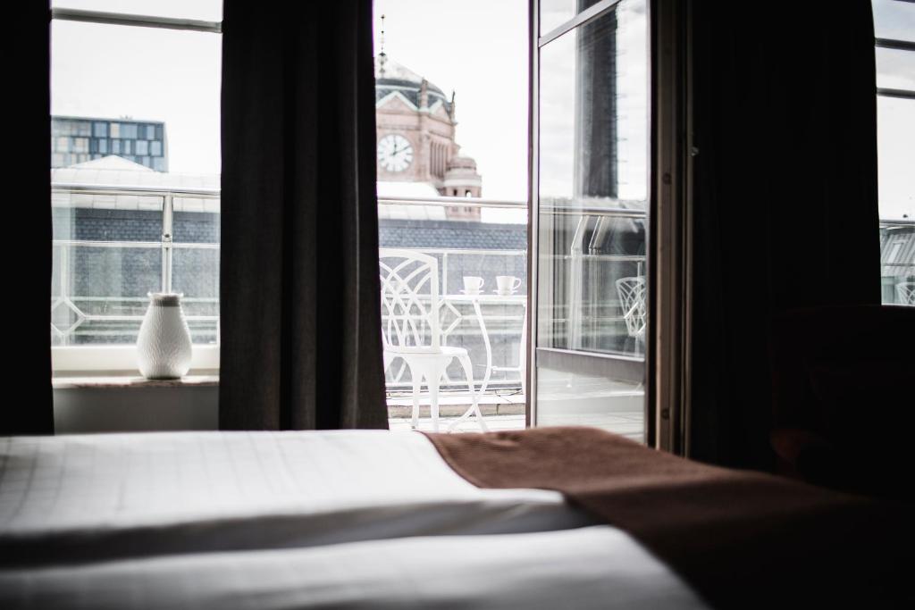 Postel nebo postele na pokoji v ubytování Freys Hotel