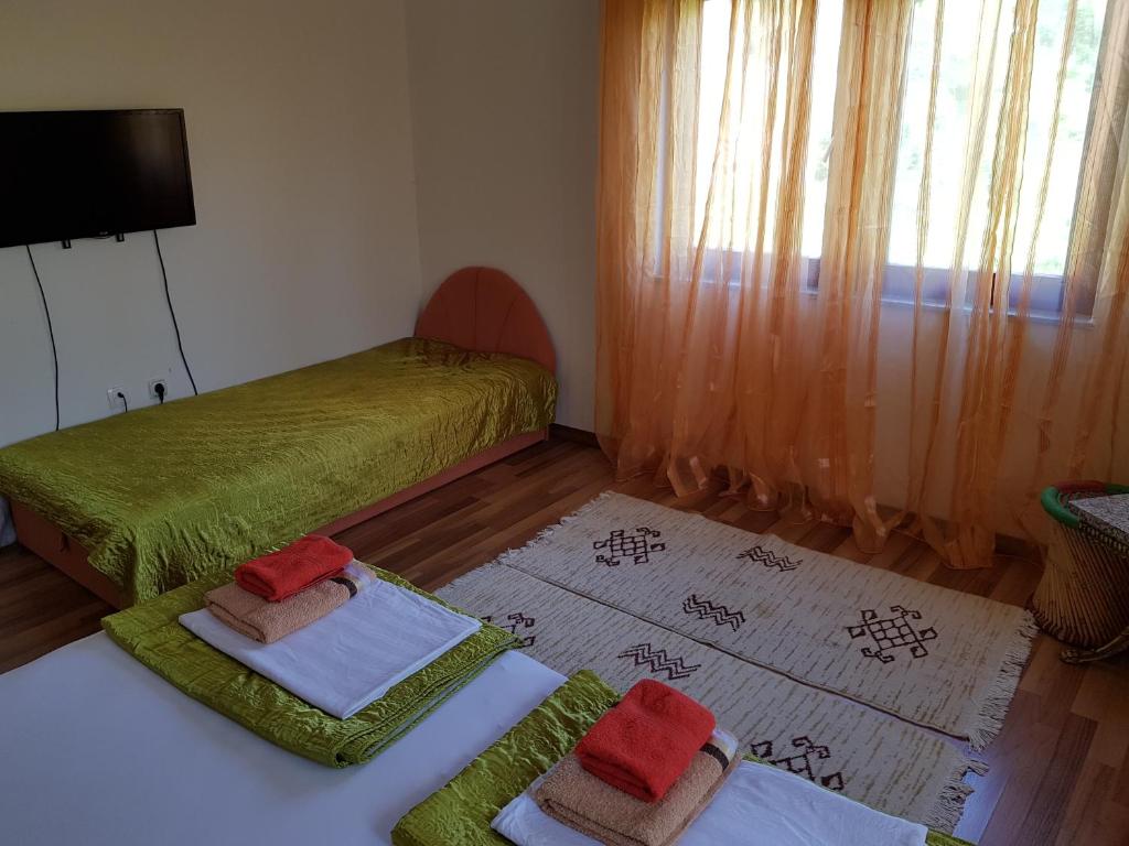 Postel nebo postele na pokoji v ubytování Guest House Goa Mostar