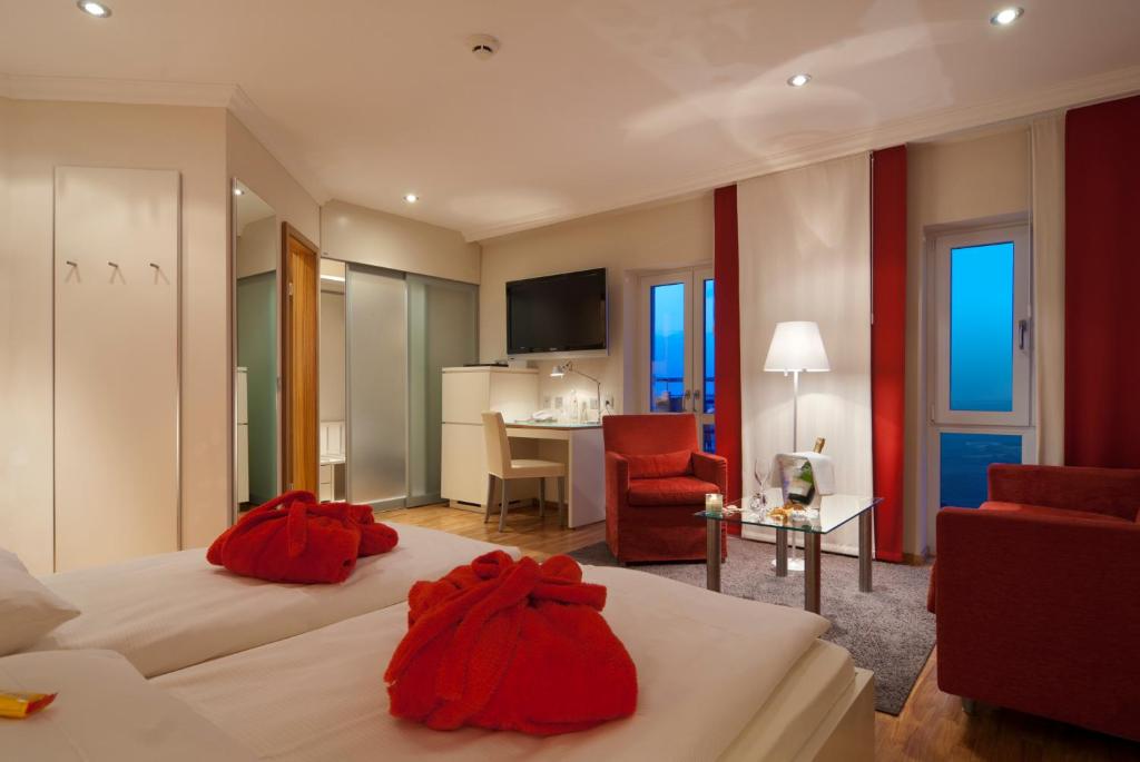 Ein Bett oder Betten in einem Zimmer der Unterkunft Strandhotel Georgshöhe